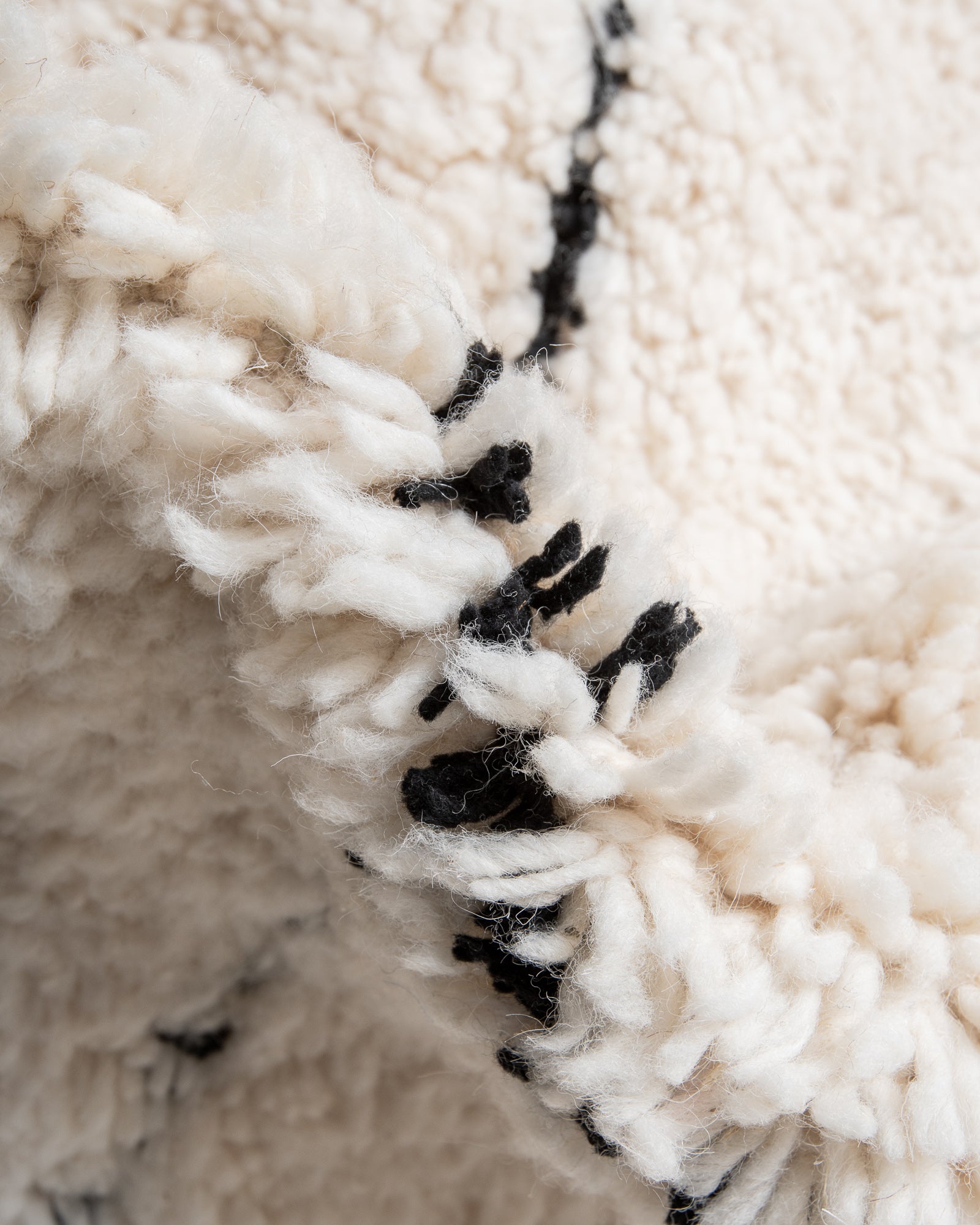 Modern, designer, handcrafted Berber rug from Morocco. Beniourain carpet with beautiful colours and patterns and fluffy wool texture.